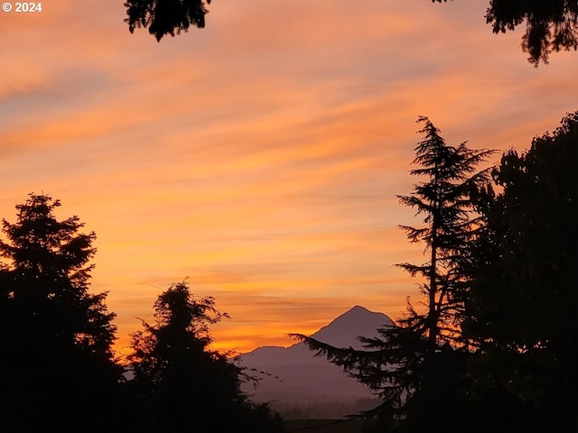 nature at dusk featuring a mountain view