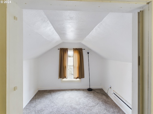 bonus room featuring carpet, lofted ceiling, baseboard heating, and a textured ceiling