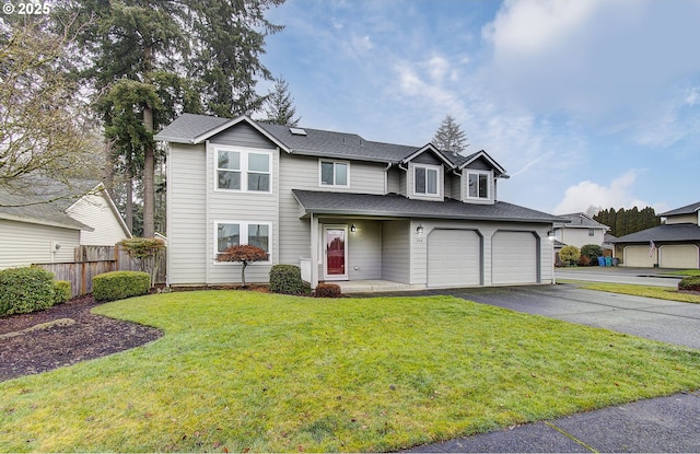 front facade with a garage and a front yard