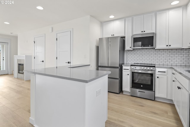 kitchen featuring white cabinetry and stainless steel appliances