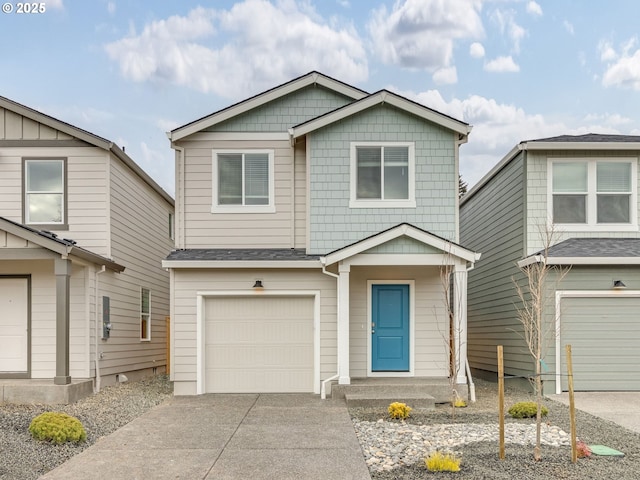 view of front of property with a garage