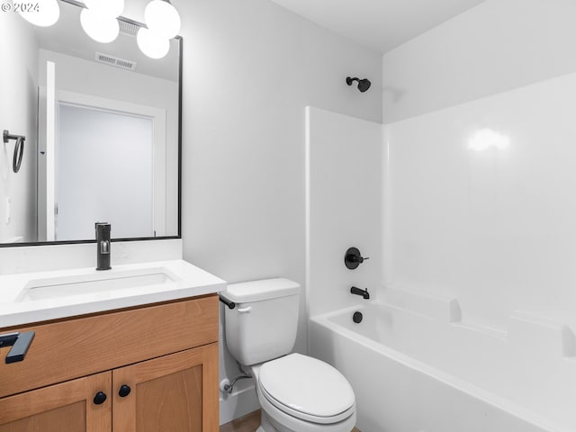 full bathroom with vanity, toilet, and bathtub / shower combination