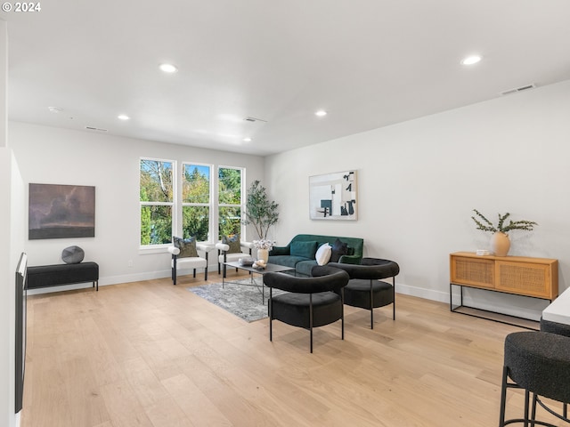 living room with light hardwood / wood-style floors