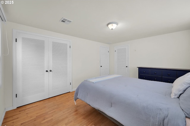 bedroom with wood-type flooring