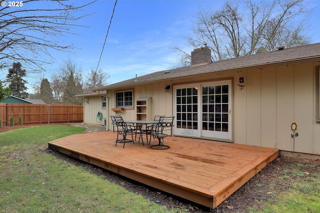 deck featuring a yard