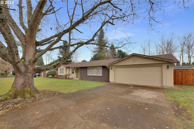 single story home featuring a garage and a front yard