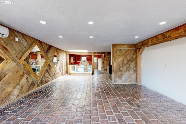 interior space featuring wood walls