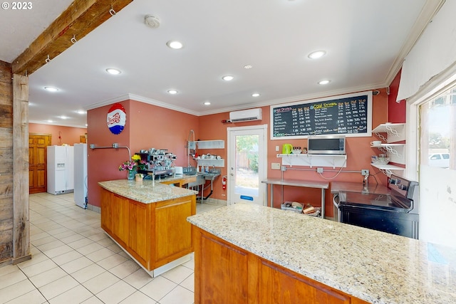 kitchen with light tile floors, an AC wall unit, light stone countertops, beamed ceiling, and white refrigerator with ice dispenser