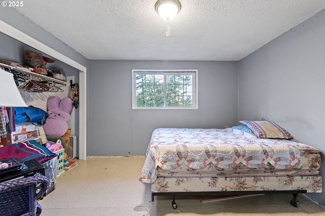 bedroom with a textured ceiling