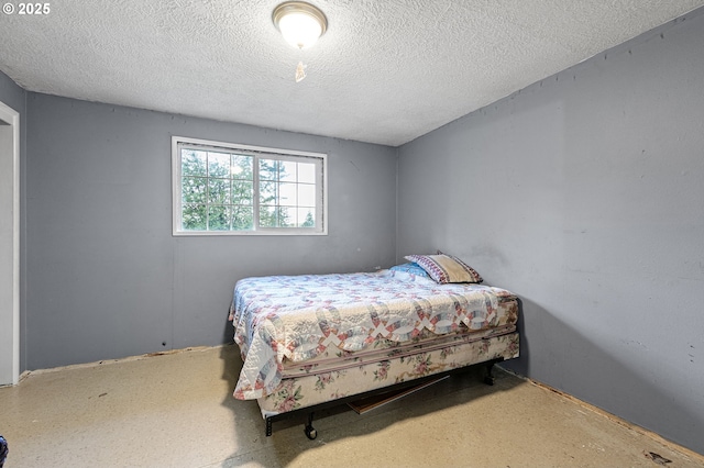 bedroom with a textured ceiling