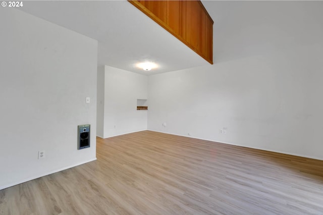 spare room featuring light hardwood / wood-style floors