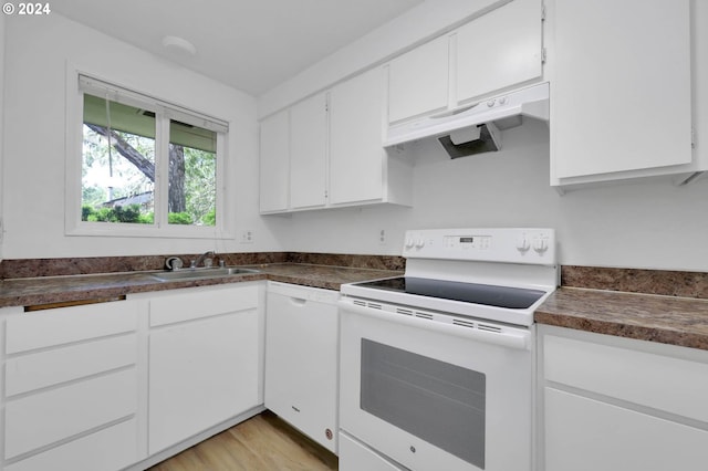 kitchen featuring white cabinetry, light wood-type flooring, white appliances, and sink