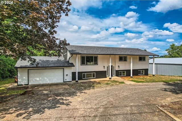 bi-level home featuring a garage