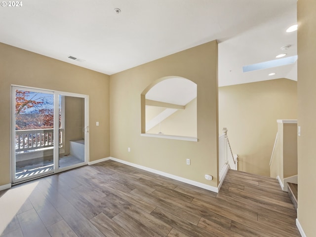 6357 NE Brighton St, Hillsboro, OR 97124 - unfurnished room with wood finished floors, baseboards, recessed lighting, a smoke detector, and fire sprinkler in ceiling