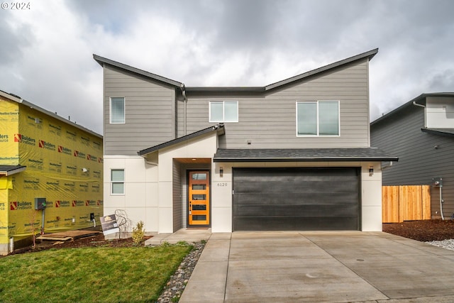 modern home featuring a garage