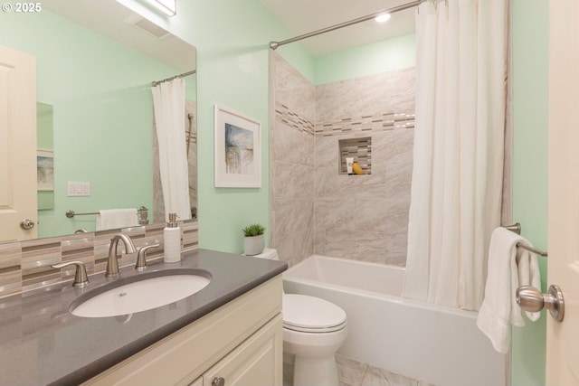 full bathroom with toilet, vanity, and shower / bathtub combination with curtain