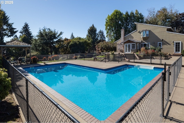 view of swimming pool with a gazebo