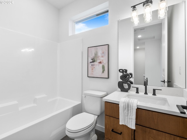 full bathroom with vanity,  shower combination, and toilet