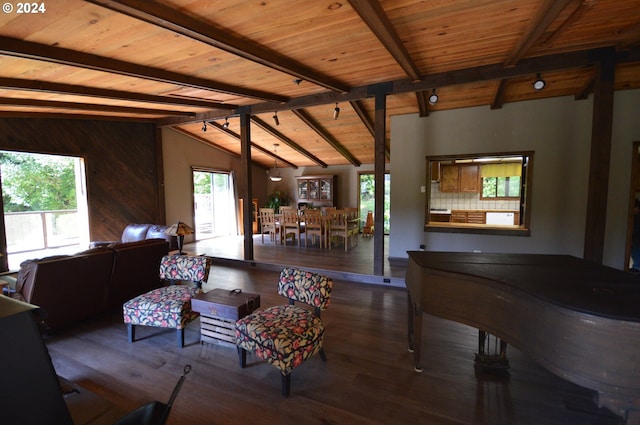 living room featuring hardwood / wood-style floors, vaulted ceiling with beams, wood walls, and wood ceiling