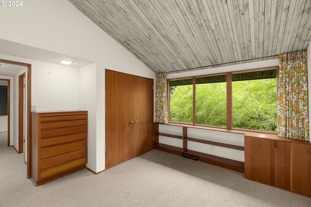 interior space featuring wooden ceiling and vaulted ceiling