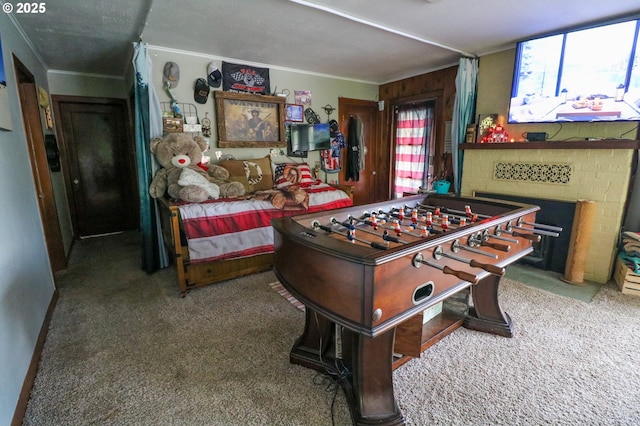 game room with carpet and ornamental molding