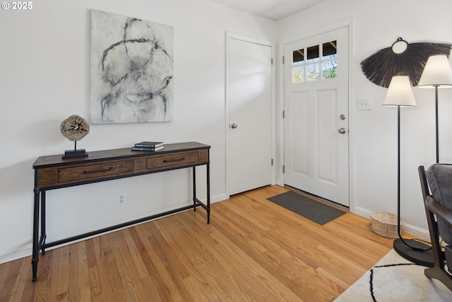 foyer entrance with light wood-style floors