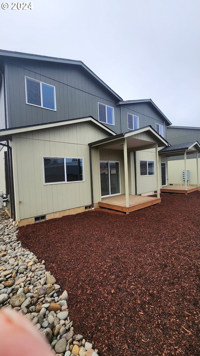 back of property featuring a patio area