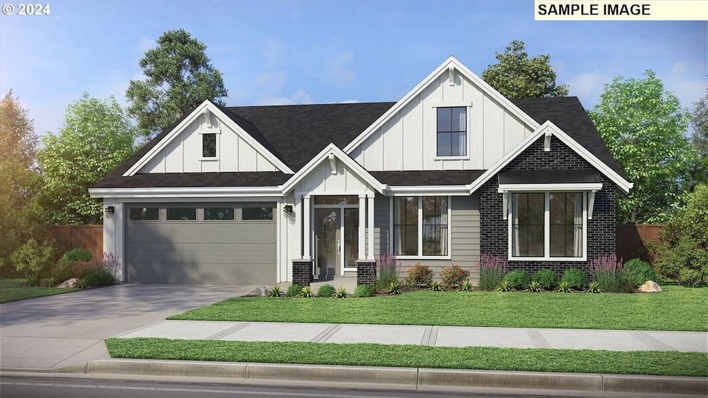 view of front facade featuring a front lawn and a garage