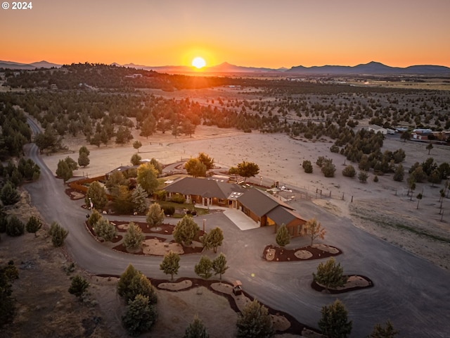 aerial view at dusk with a mountain view