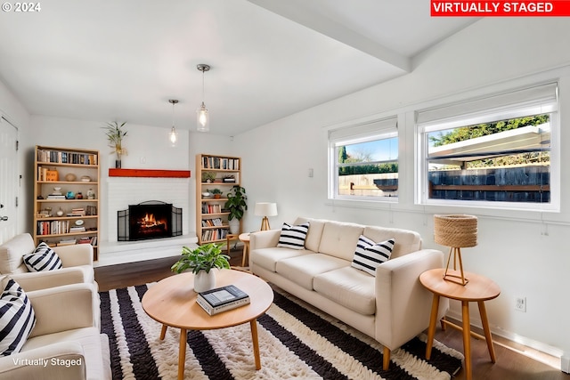 living room with dark hardwood / wood-style flooring