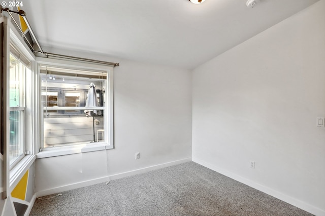 empty room featuring carpet floors