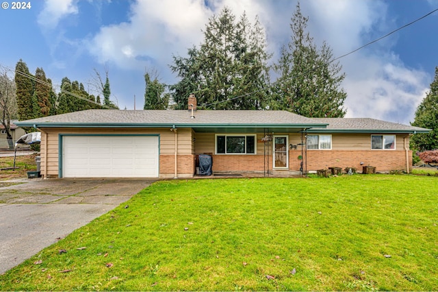 ranch-style house with a front lawn and a garage