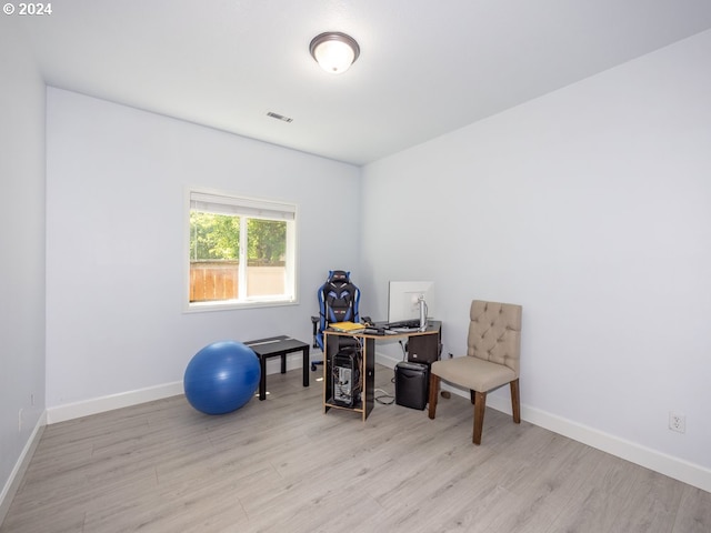 sitting room with light hardwood / wood-style flooring