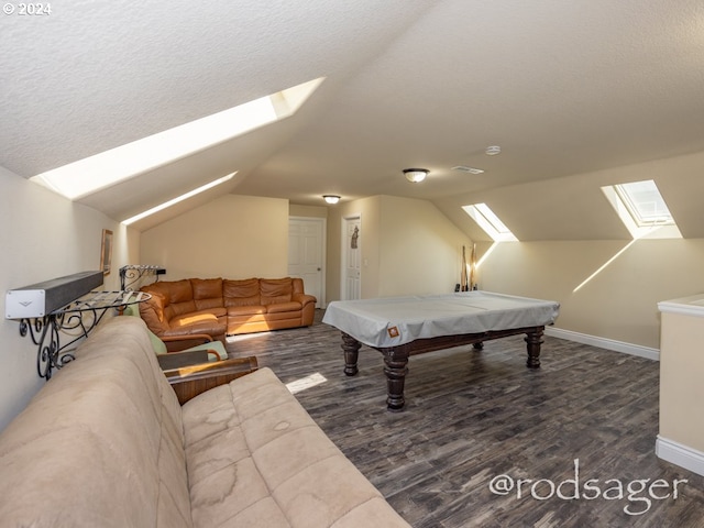 rec room with dark hardwood / wood-style flooring, lofted ceiling with skylight, a textured ceiling, and pool table