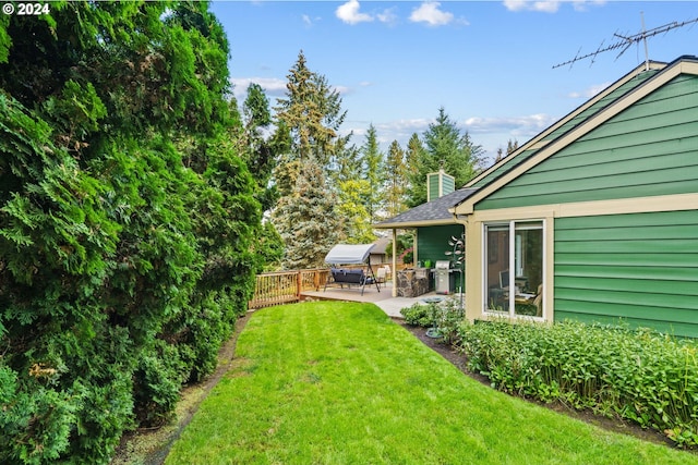 view of yard with a patio area