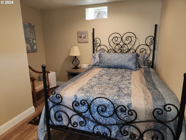 29840 Mary St, Gold Beach, OR 97444 - bedroom with wood finished floors and baseboards