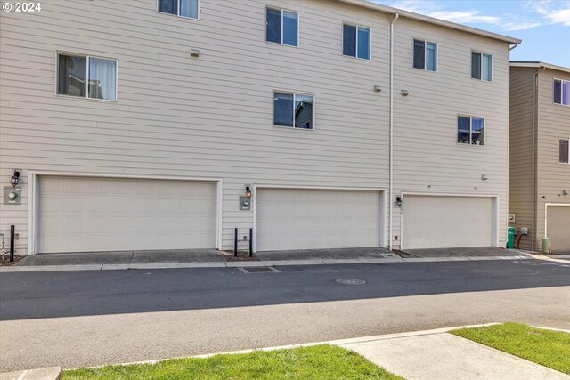 exterior space with a garage