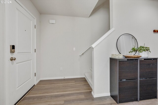 foyer with light hardwood / wood-style flooring