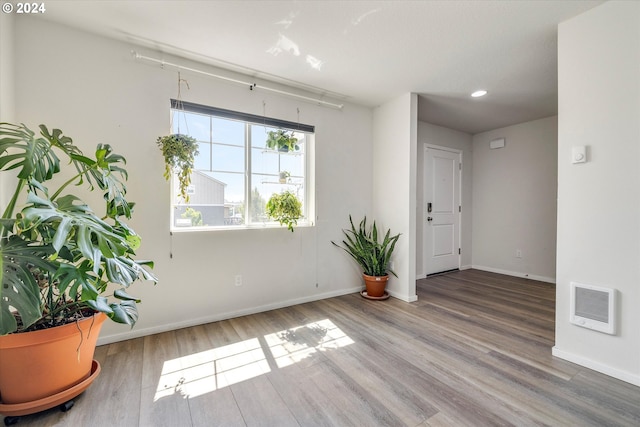 17347 NW Shackelford Rd, Portland, OR 97229 - staircase featuring wood finished floors, baseboards, and recessed lighting