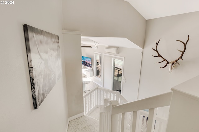 535 NE Bridgeton Rd Unit 7, Portland, OR 97211 - corridor with an upstairs landing, lofted ceiling, and baseboards