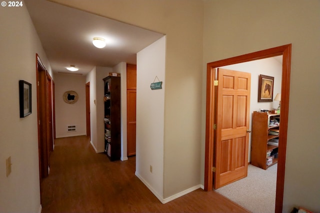 hall featuring dark hardwood / wood-style floors