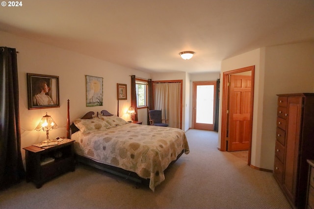 bedroom with light carpet