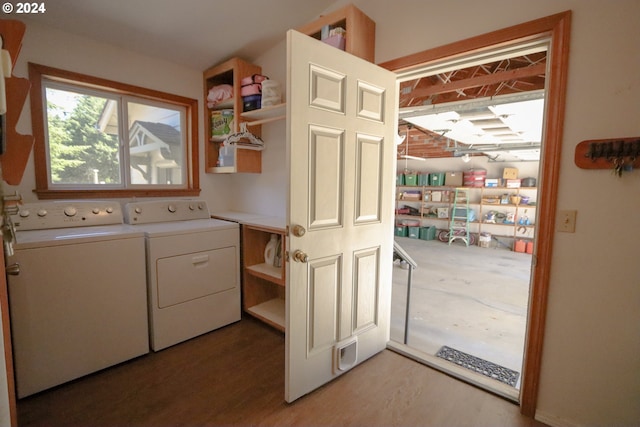 laundry room featuring separate washer and dryer and light wood-type flooring