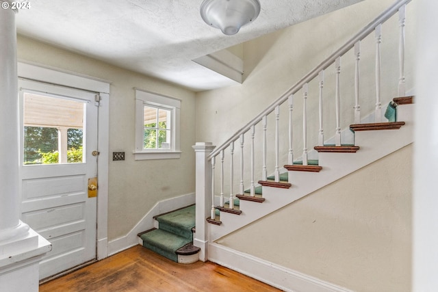 entrance foyer with hardwood / wood-style flooring