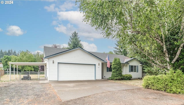 single story home with driveway, a garage, a gate, fence, and a carport