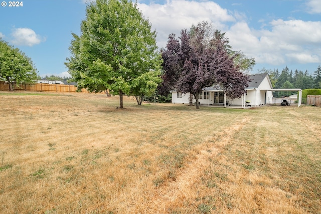 view of yard with fence