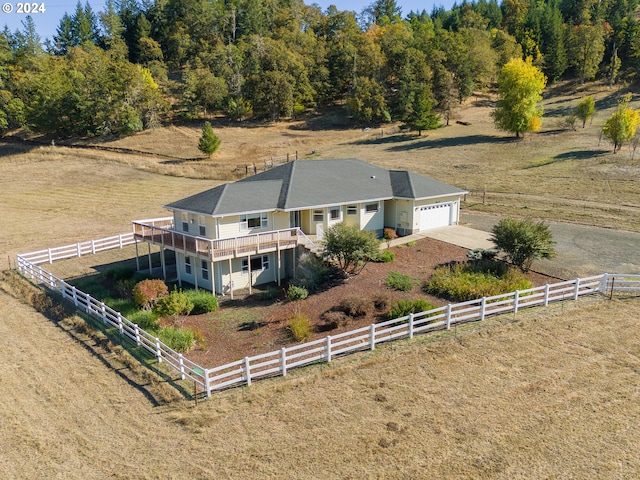 birds eye view of property featuring a rural view