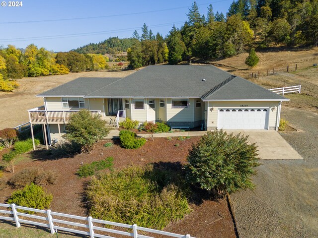 ranch-style house featuring a garage