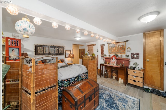 bedroom featuring wood finished floors