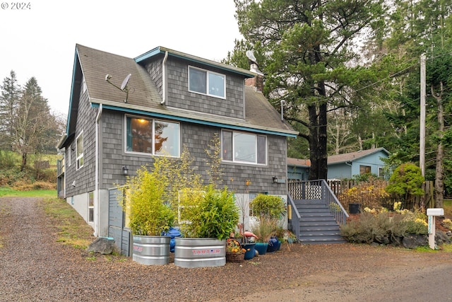 view of front of house with a chimney